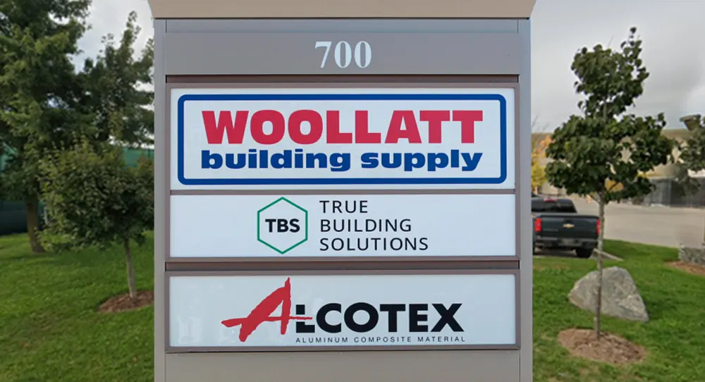 ABOUT US - Woollatt Building Supply signage